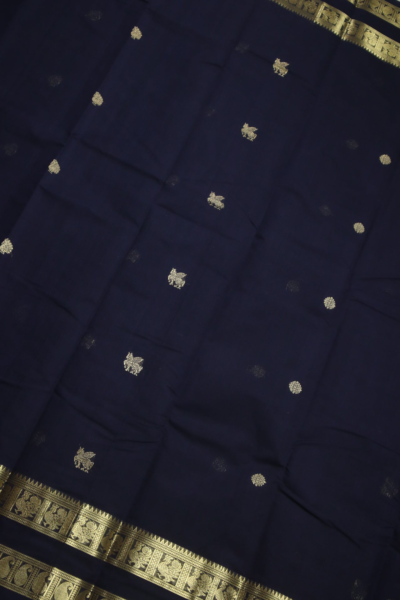 Navy Blue - - Zari woven all over buttas with woven pallu