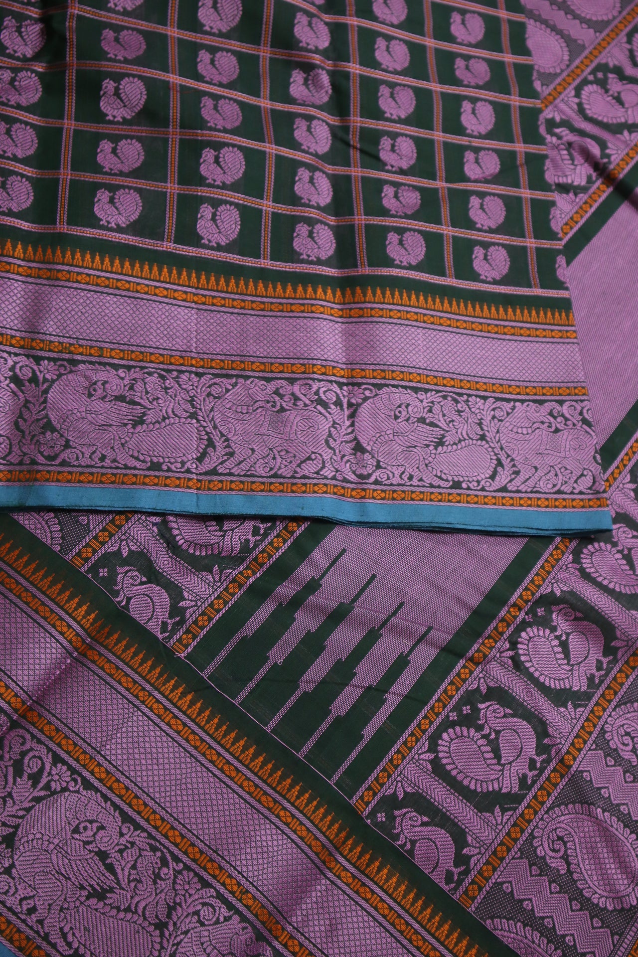 Deepest green - Annapakshi Thread work 1000 woven buttas with woven pallu