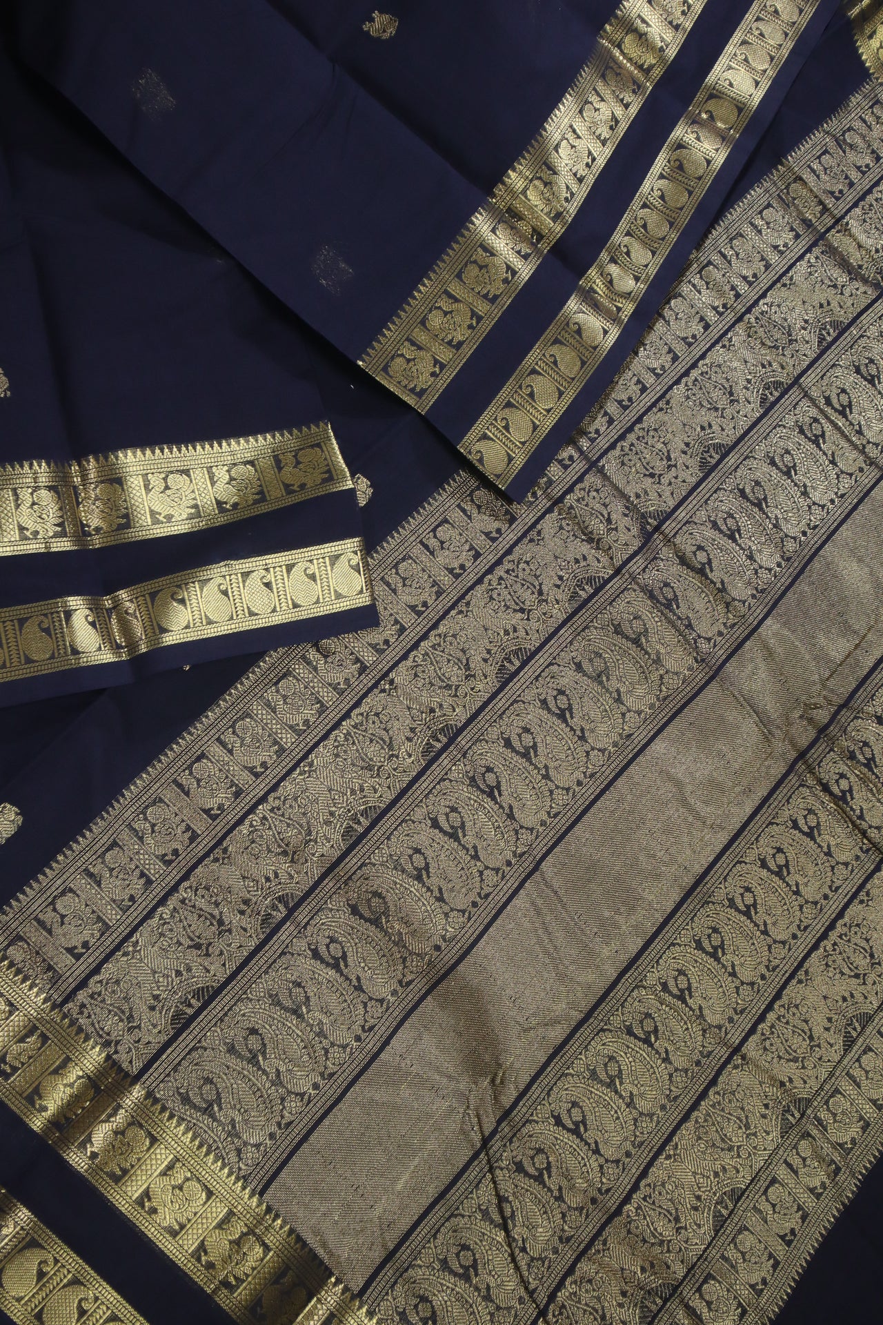 Navy Blue - - Zari woven all over buttas with woven pallu