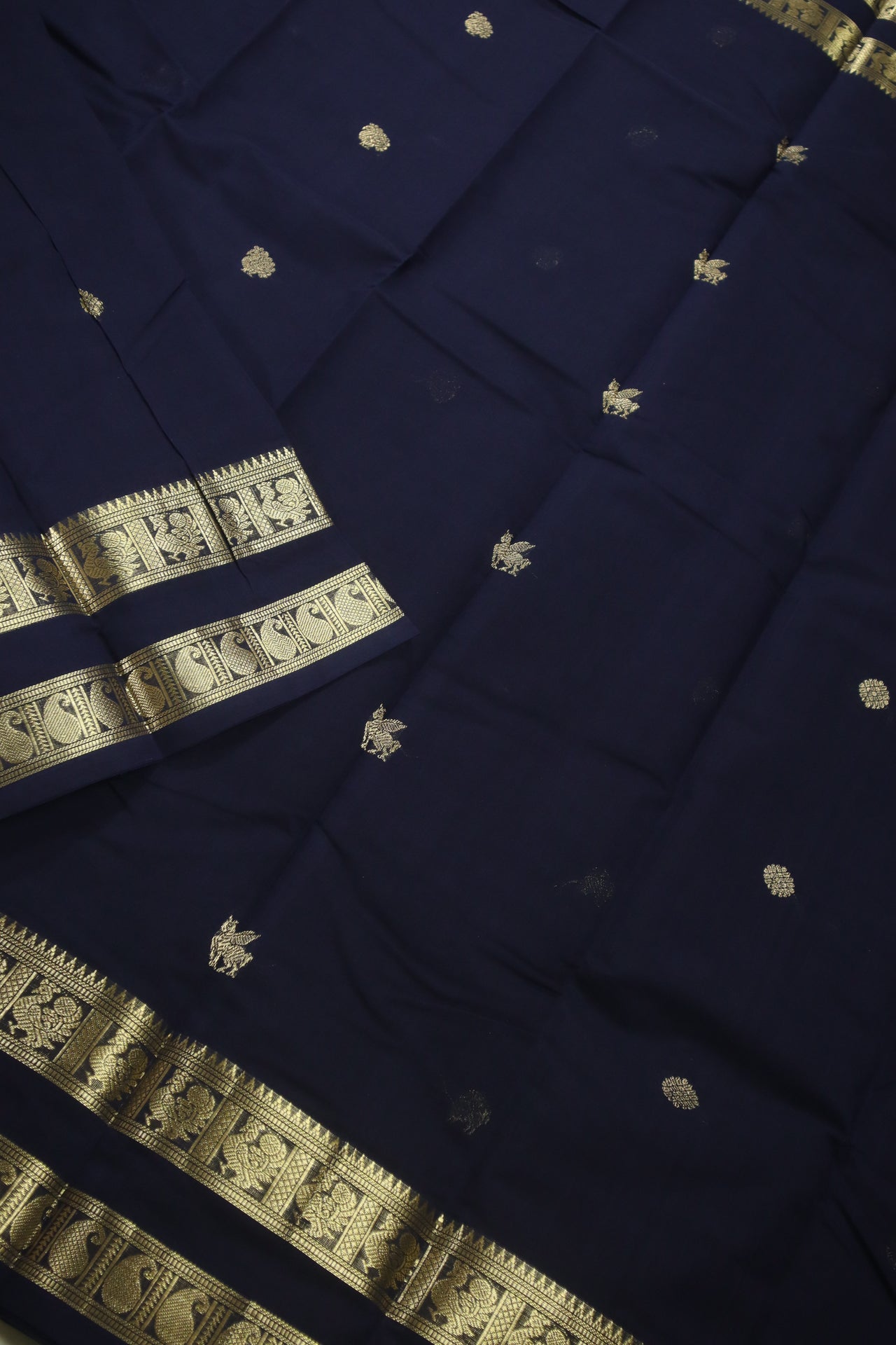 Navy Blue - - Zari woven all over buttas with woven pallu